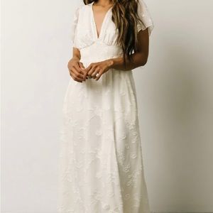Brand new and never worn Evelyn Smocked Maxi Dress from Baltic Born.
